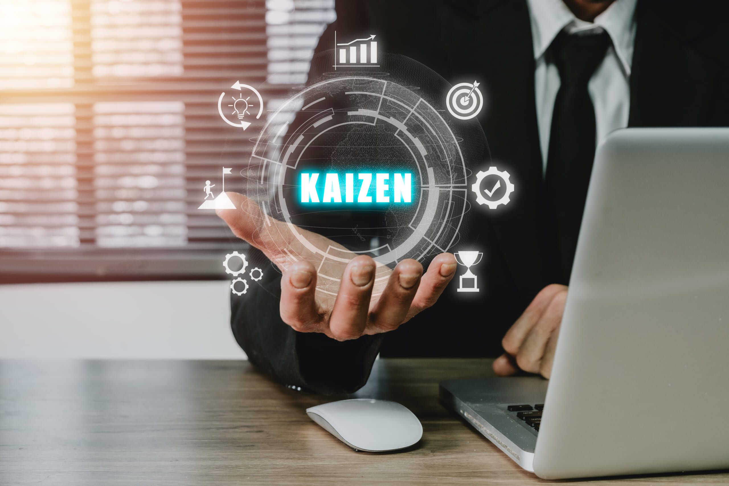 Kaizen Concept, Businessman Hand Holding Kaizen Icon On Virtual